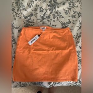 Never worn Garage mini skirt. Great color. Size Small.